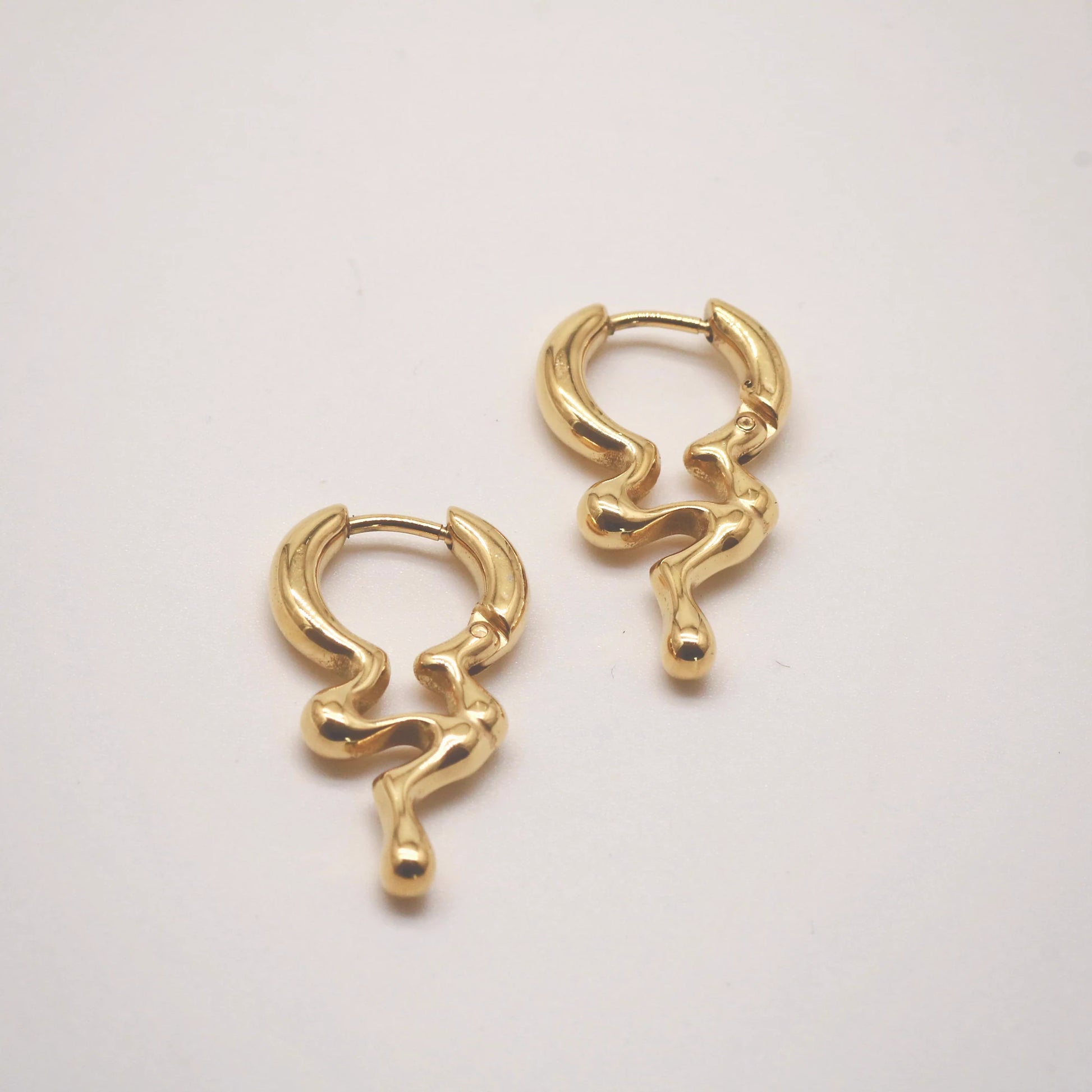 Gold dripping hoop earrings