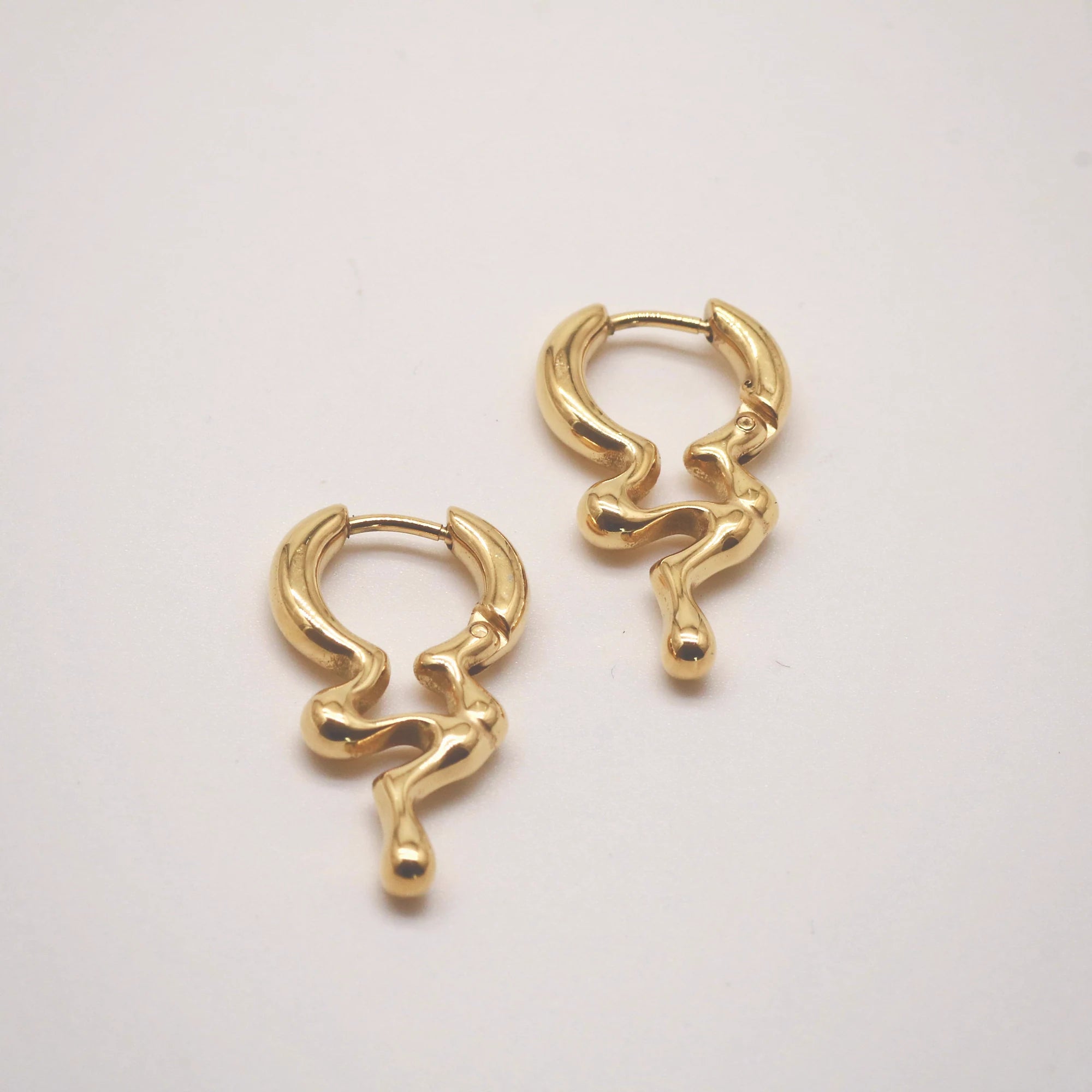 Gold dripping hoop earrings