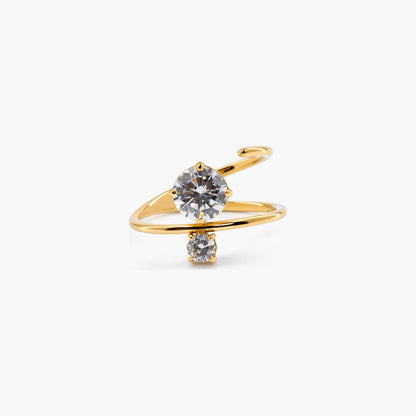 A gold ring with two spark stones