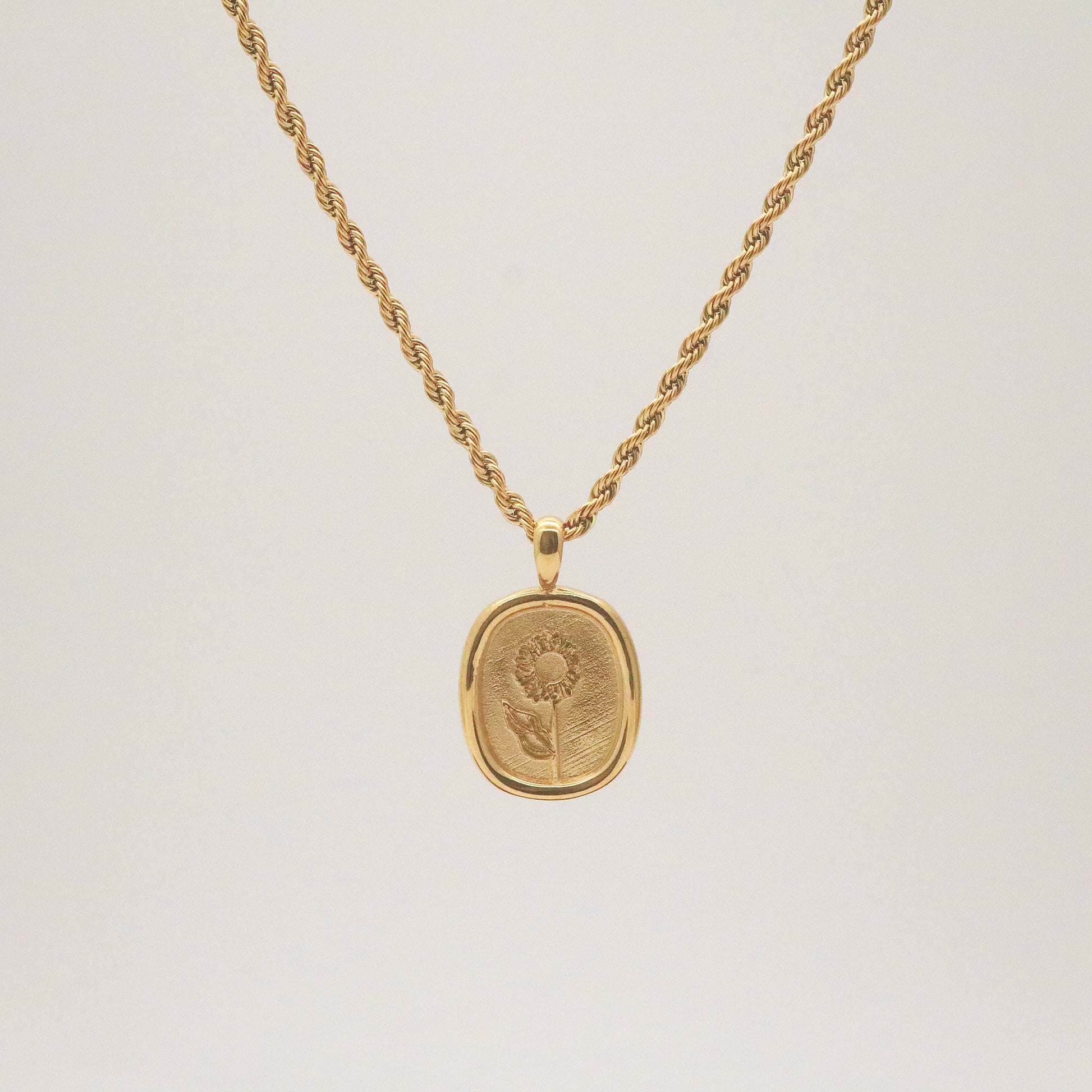 Effie flower engraved pendant necklace