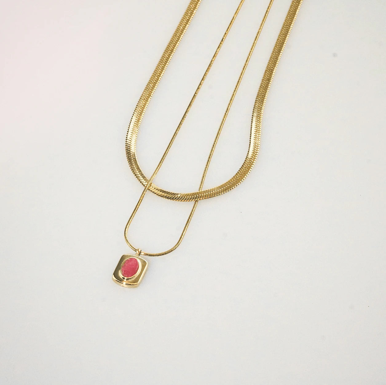 Meideya jewelry layered necklace with a pink gemstone pendant 
