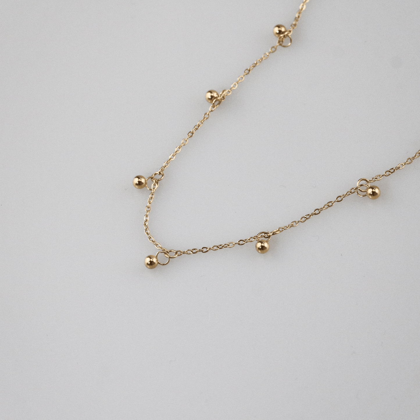 Gold Bead Station Necklace