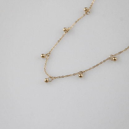 Gold Bead Station Necklace