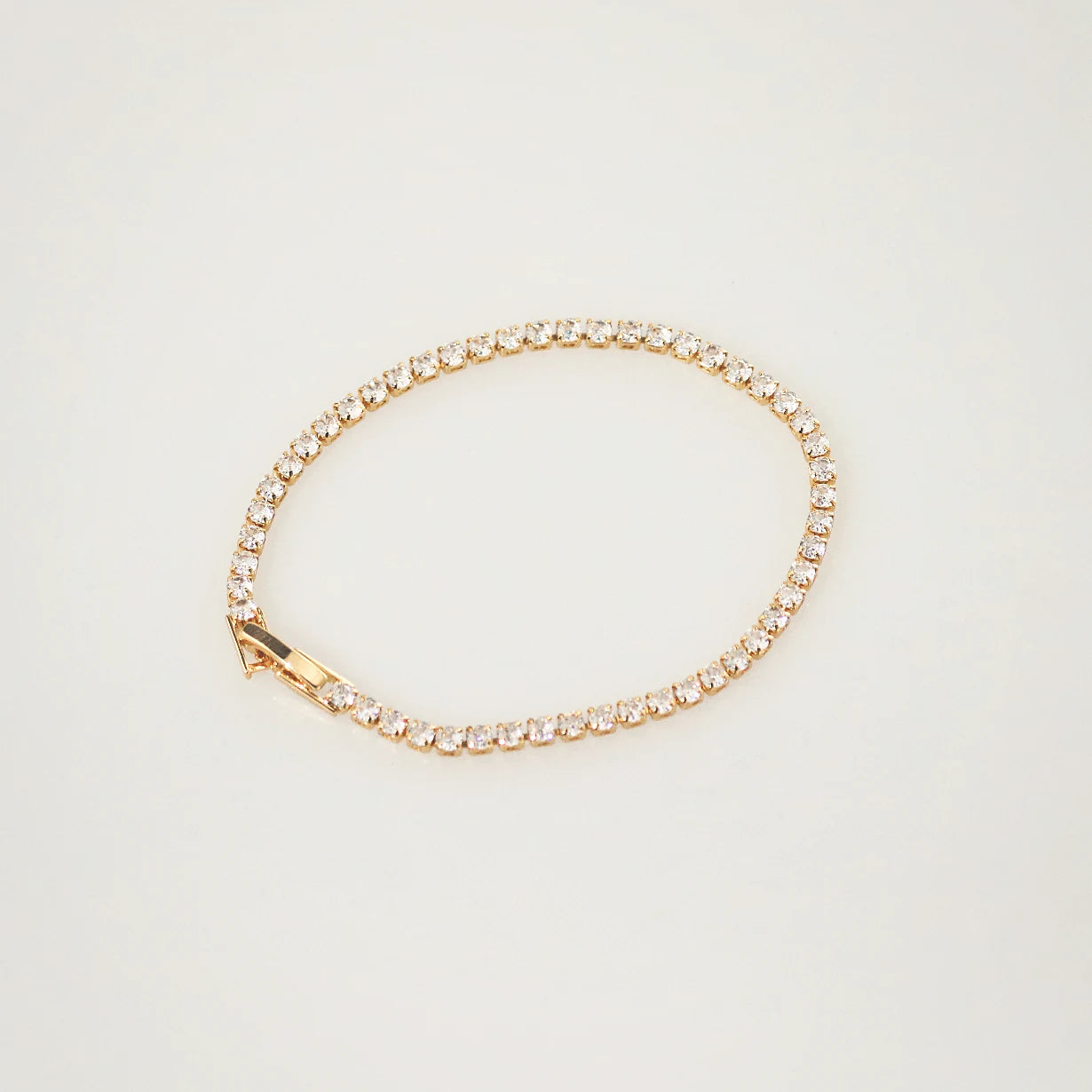 Gold tennis bracelet