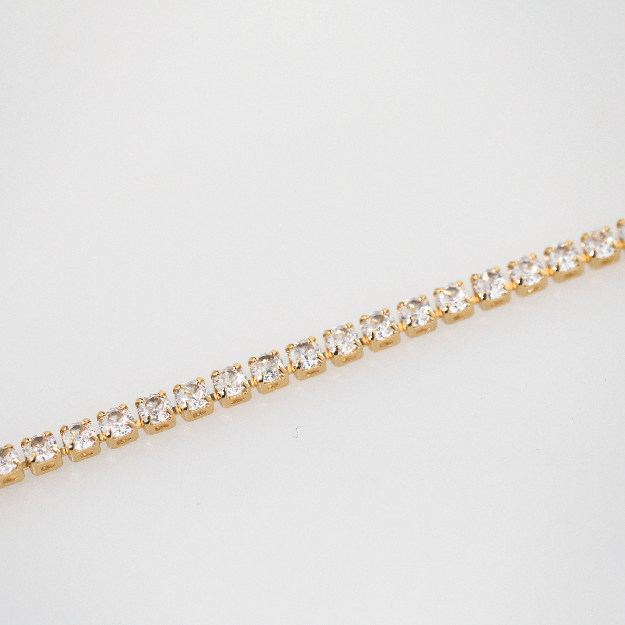 gold tennis chain