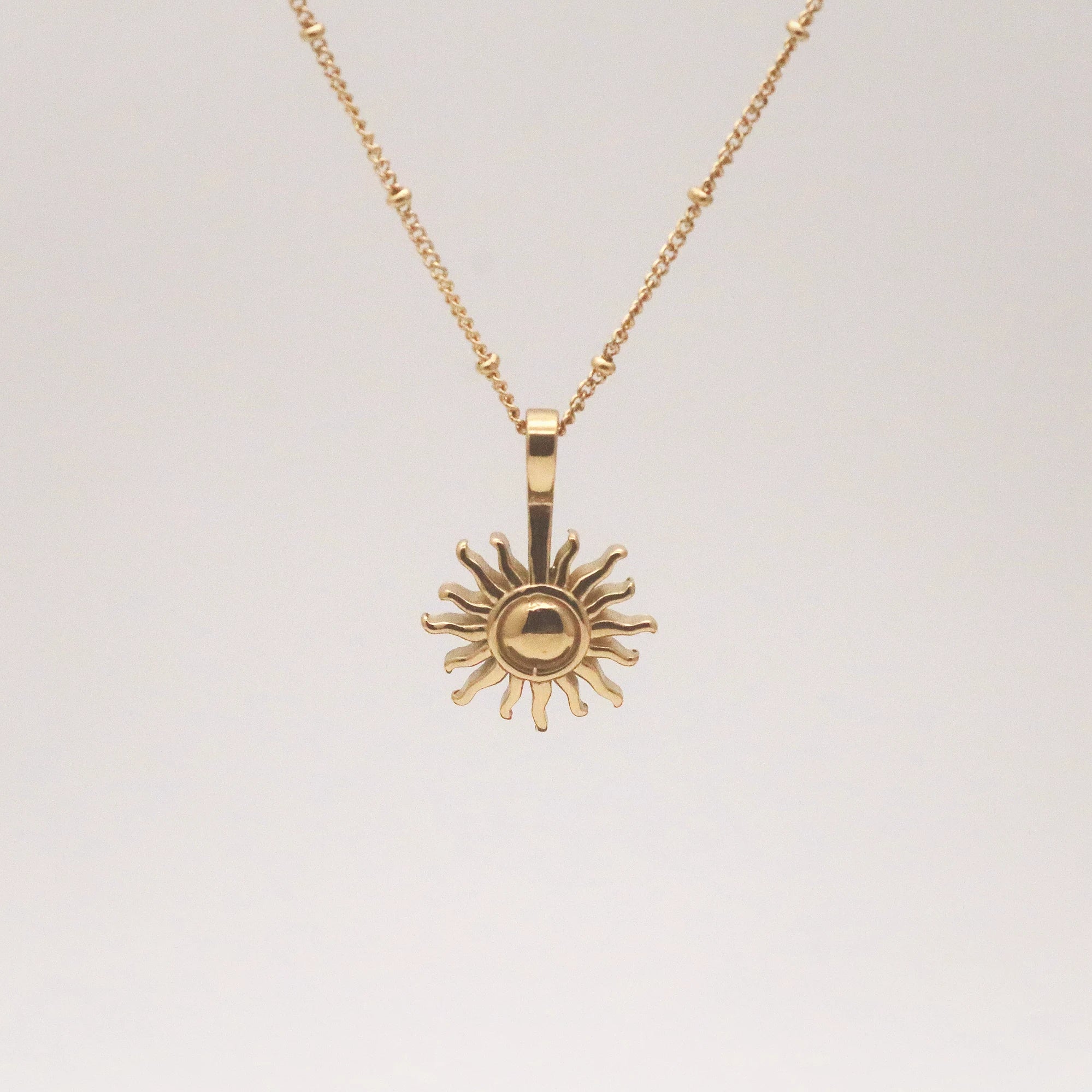 gold sun necklace