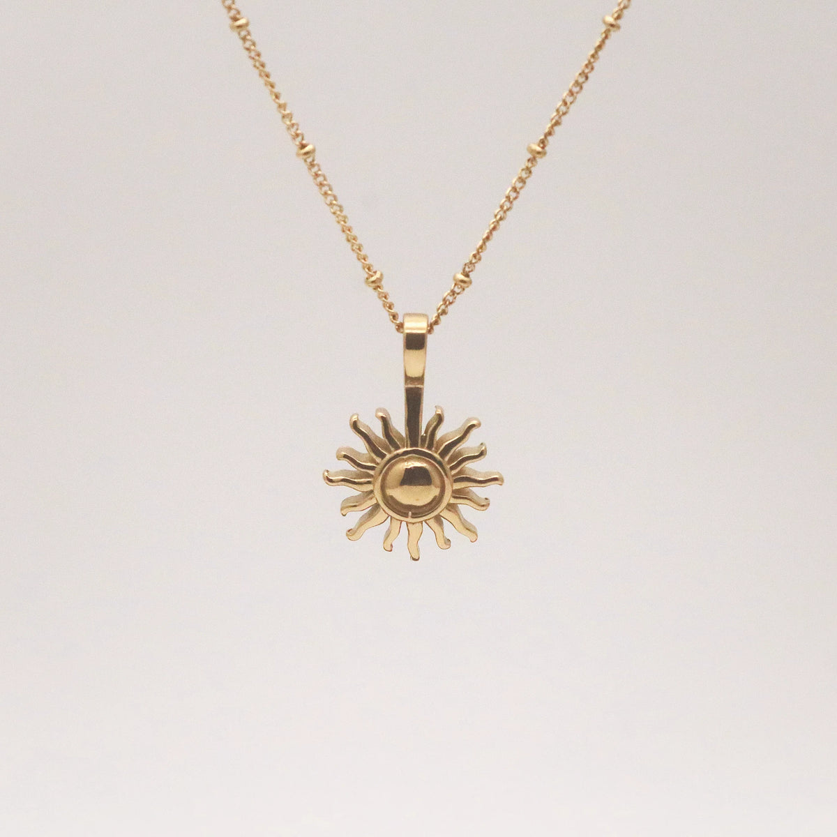 gold sun necklace