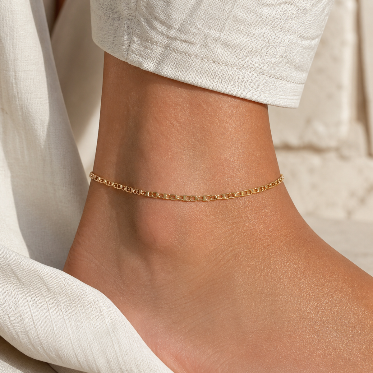 Anchor Chain Anklet worn — 18k gold-plated 316L stainless steel, water-resistant