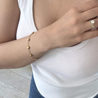 Gold-Herz-Zirkonia-Stationsarmband – Wasserfest, 18k vergoldet