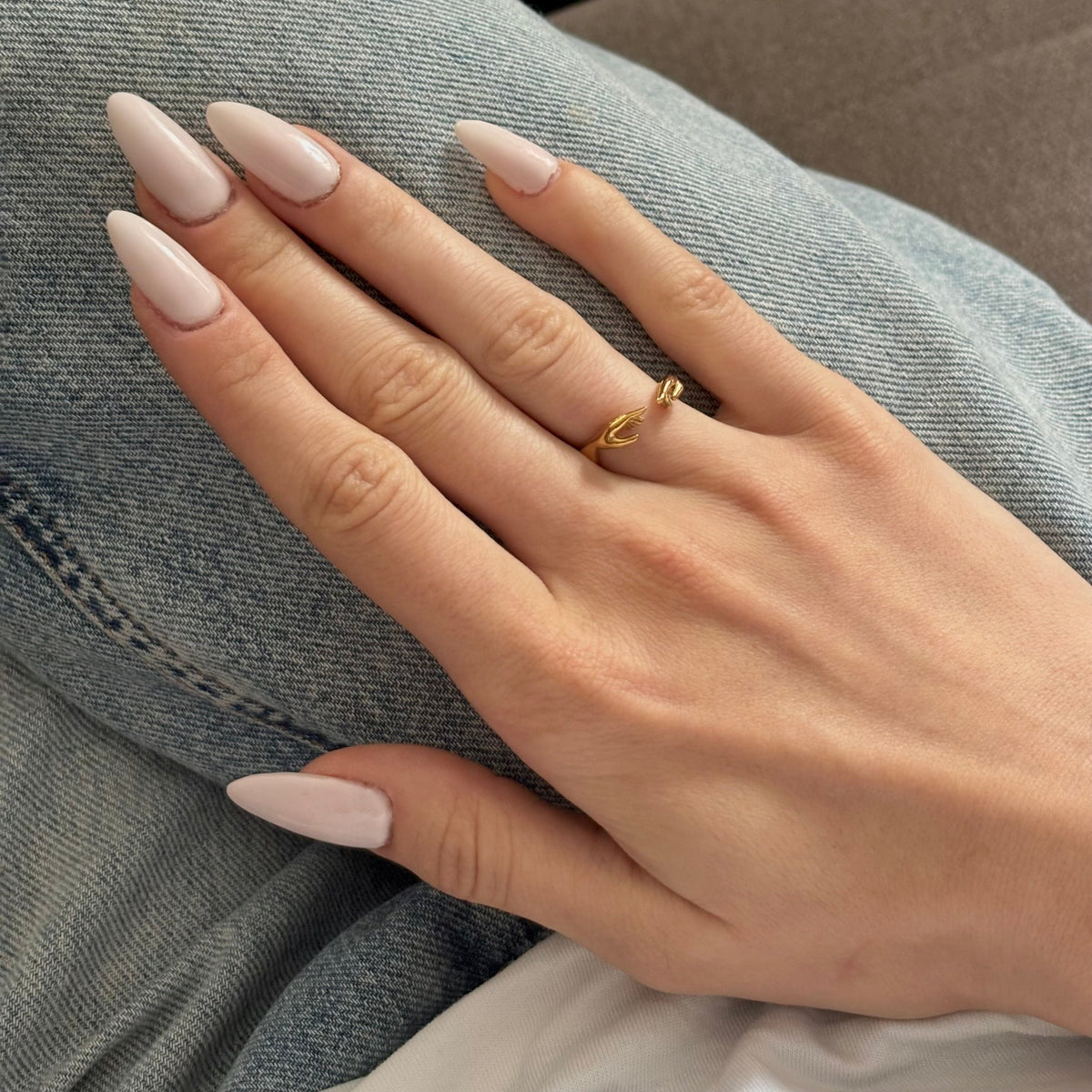 gold hands ring