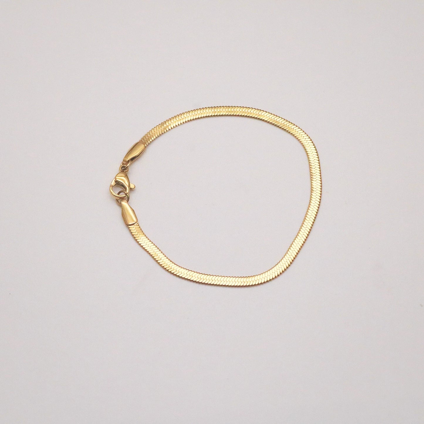 gold herringbone bracelet