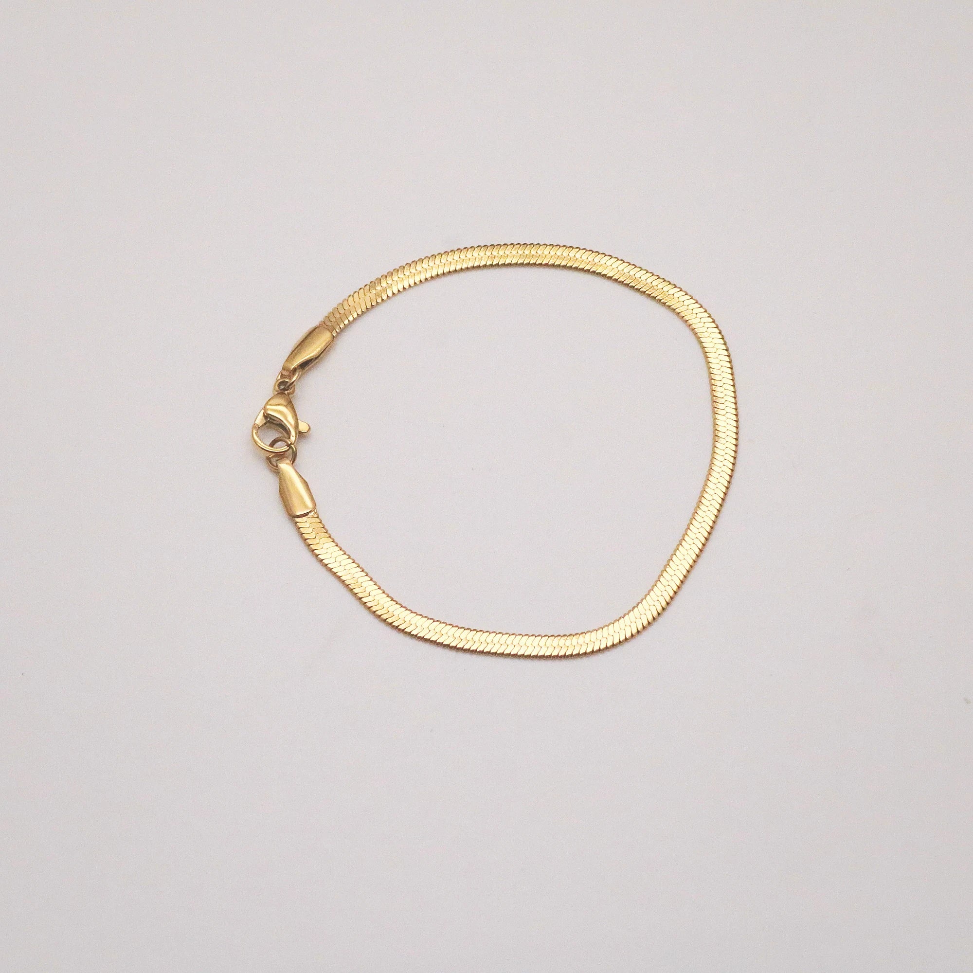 gold herringbone bracelet