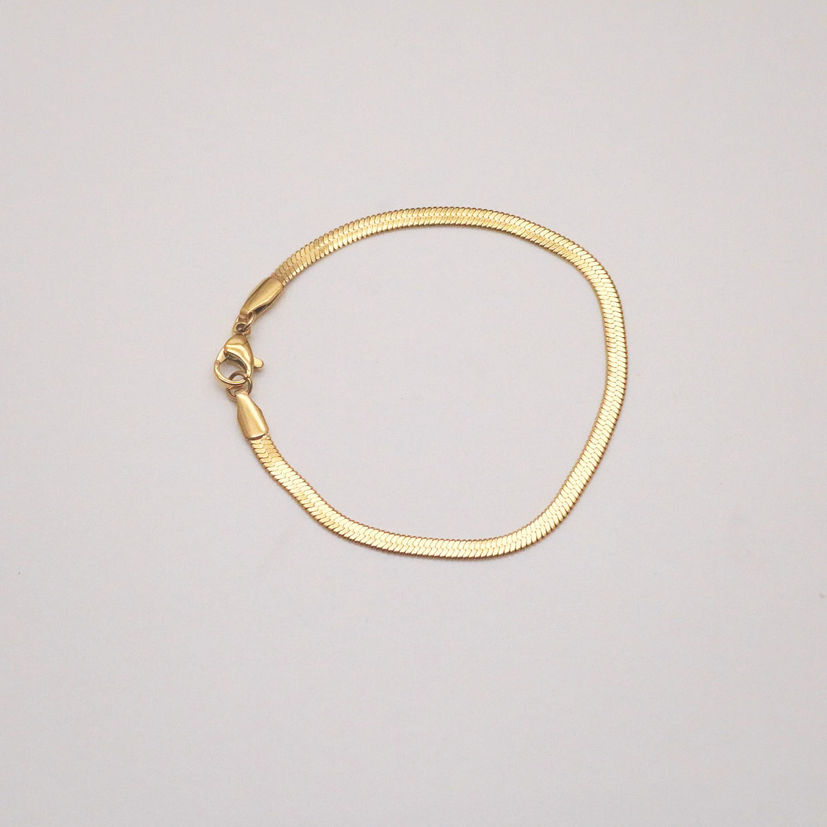 gold herringbone bracelet