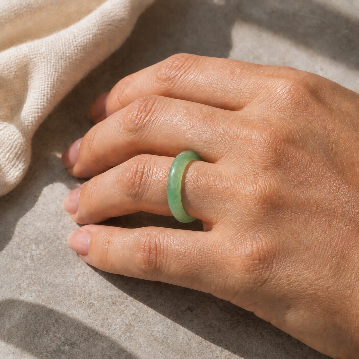 Light Green Jade Band Ring - Hypoallergenic 316L Stainless Steel worn — 18k gold-plated 316L stainless steel, water-resistant