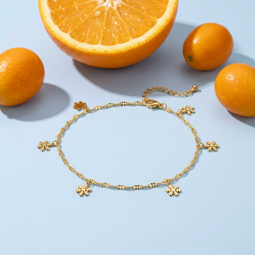 Snowflake Anklet – Waterproof Gold Charm styled still life