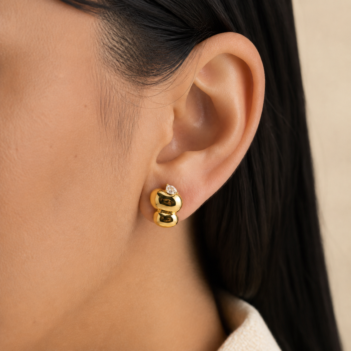 Molten Stud Earrings worn — 18k gold-plated 316L stainless steel, water-resistant