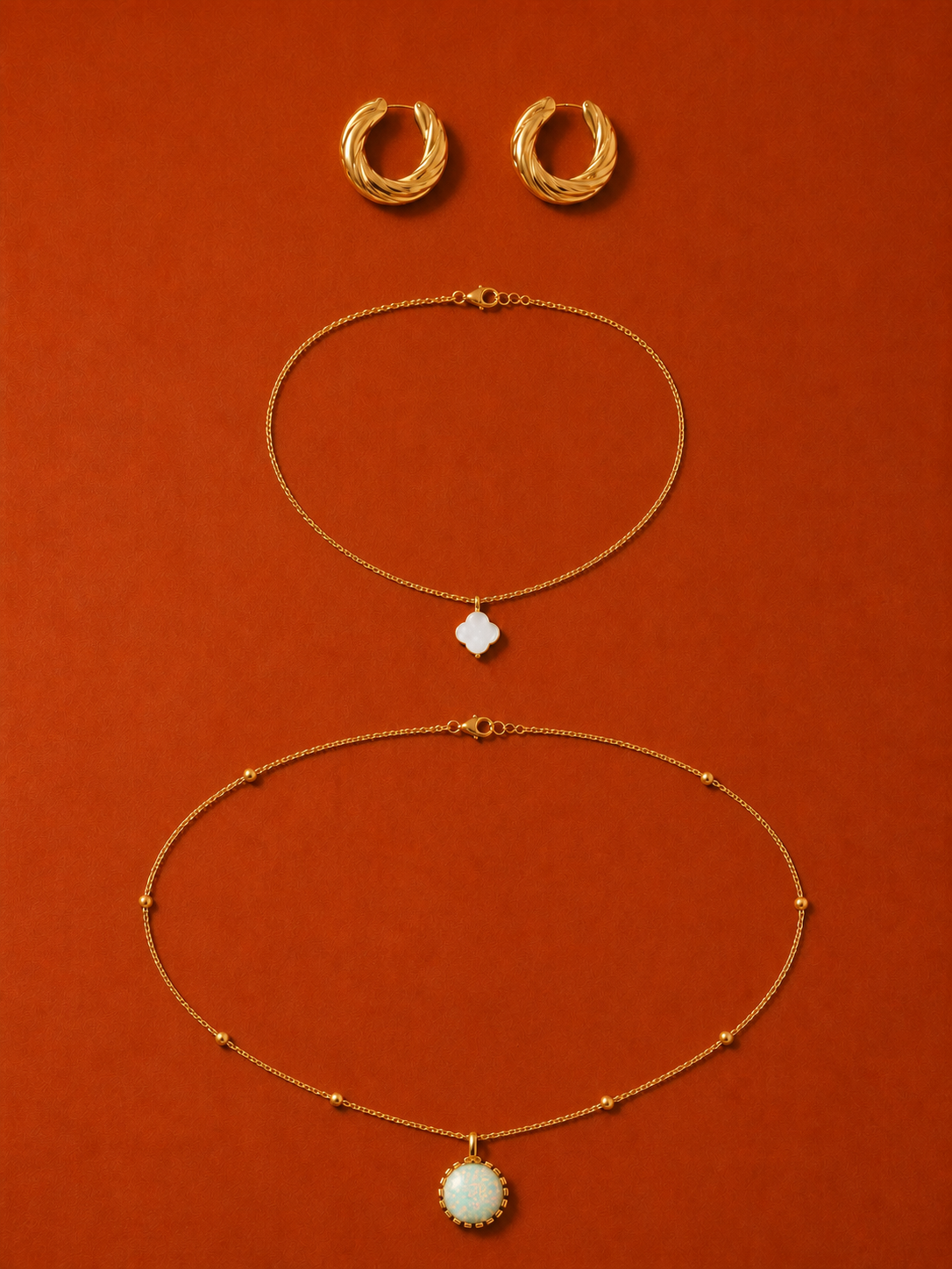 Terracotta Gaze jewelry set — flat lay