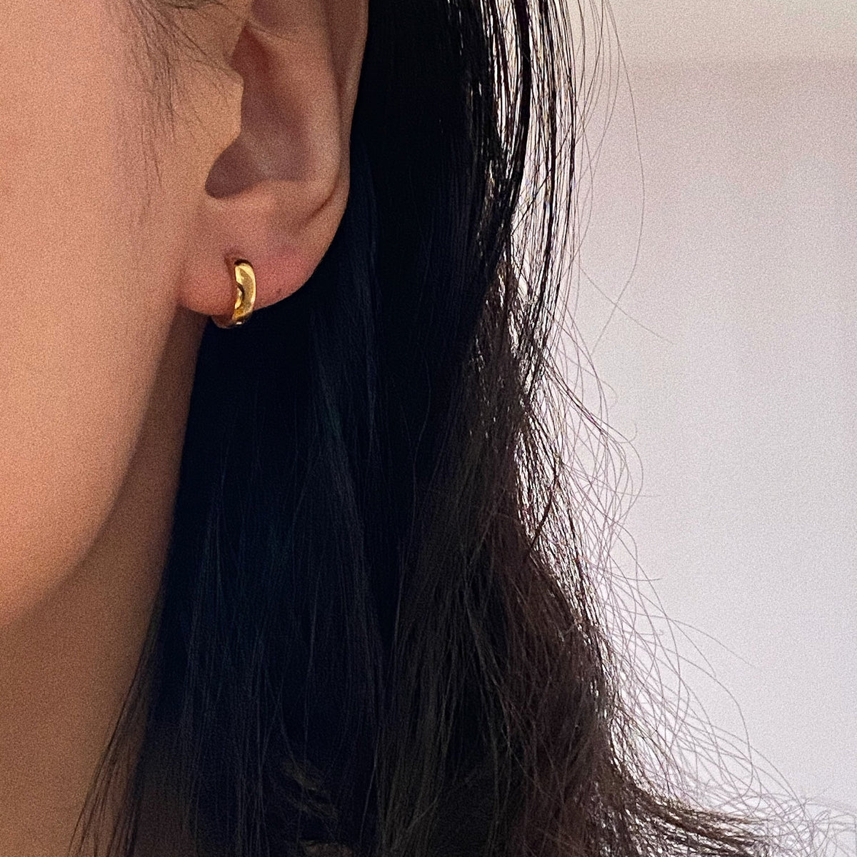 Tiny gold hoops for everyday
