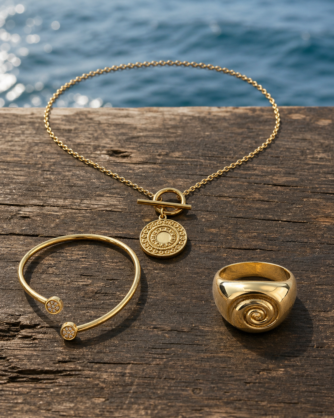 Wild Coast Gold Marks jewelry set — flat lay