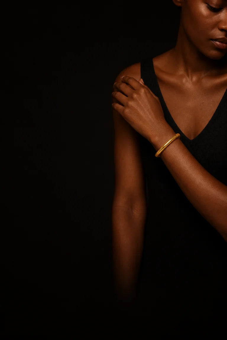 Chunky Square Bangle worn in a dark editorial portrait